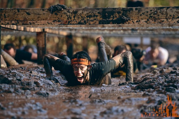 Tough Mudder is a 12 mile obstacle course designed to test all-around strength, stamina, teamwork, and mental grit.