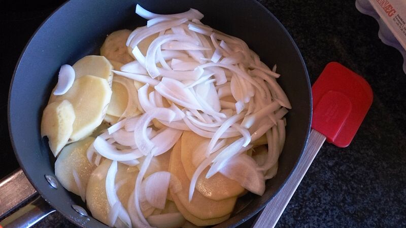 Tortilla potatoes and onion raw