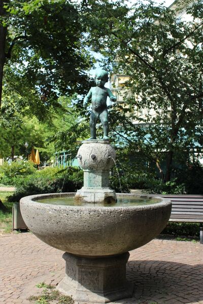Child statue in park Wendy Beauty Baden-Baden